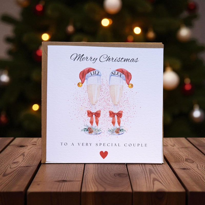 Personalised Couple Christmas Card, Champagne Glasses, Festive Design, Kraft Envelope (6x6 inches)