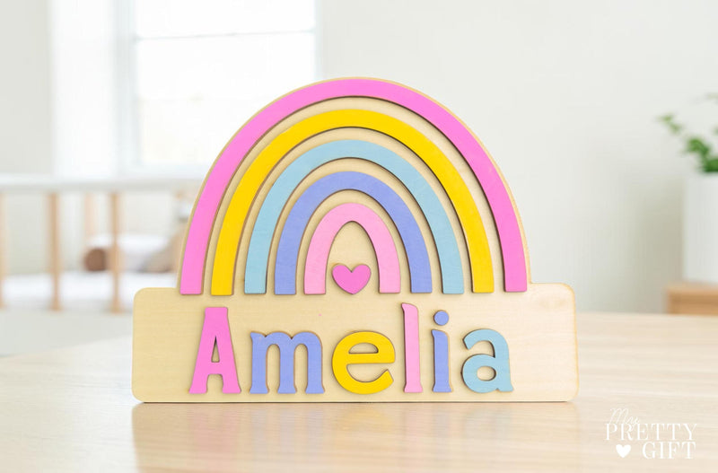 Personalised wooden name plaque for kids bedrooms or nursery rooms, featuring a lovely rainbow  theme. Customised with your child’s name, with the name  Available in different colour options and ideal as a baby shower, birthday, or nursery gift.
