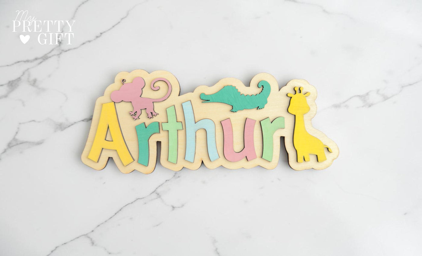 Personalised wooden name plaque for kids bedrooms or nursery rooms, featuring a lovely animal  theme. Customised with your child’s name, with the name  Available in different colour options and ideal as a baby shower, birthday, or nursery gift.