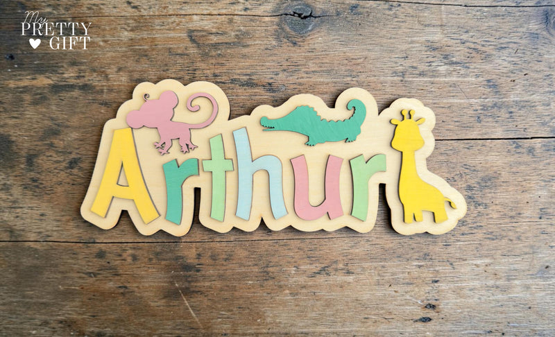Personalised wooden name plaque for kids bedrooms or nursery rooms, featuring a lovely animal  theme. Customised with your child’s name, with the name  Available in different colour options and ideal as a baby shower, birthday, or nursery gift.
