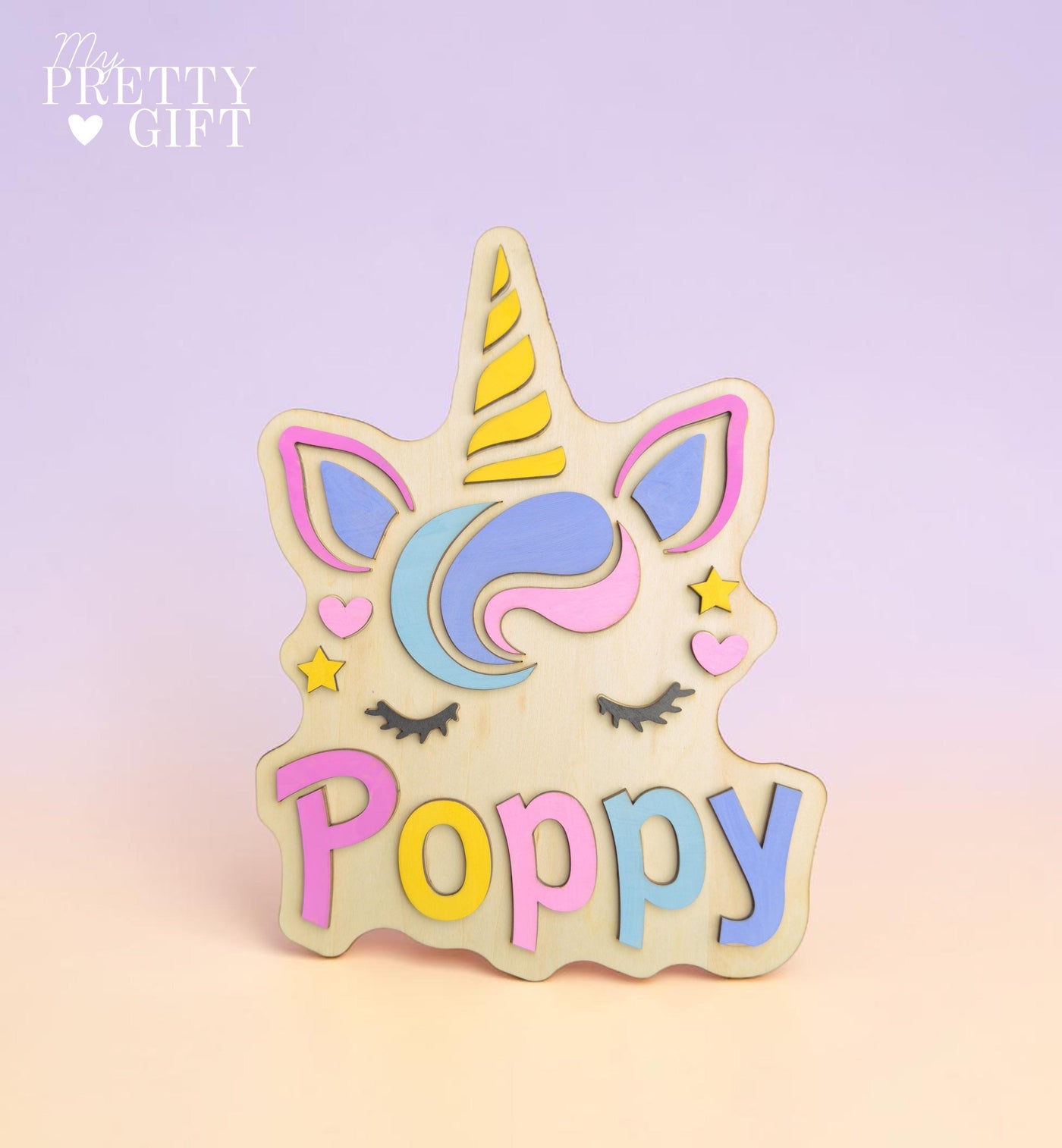 Personalised wooden name plaque for kids bedrooms or nursery rooms, featuring a lovely unicorn  theme. Customised with your child’s name, with the name  Available in different colour options and ideal as a baby shower, birthday, or nursery gift.